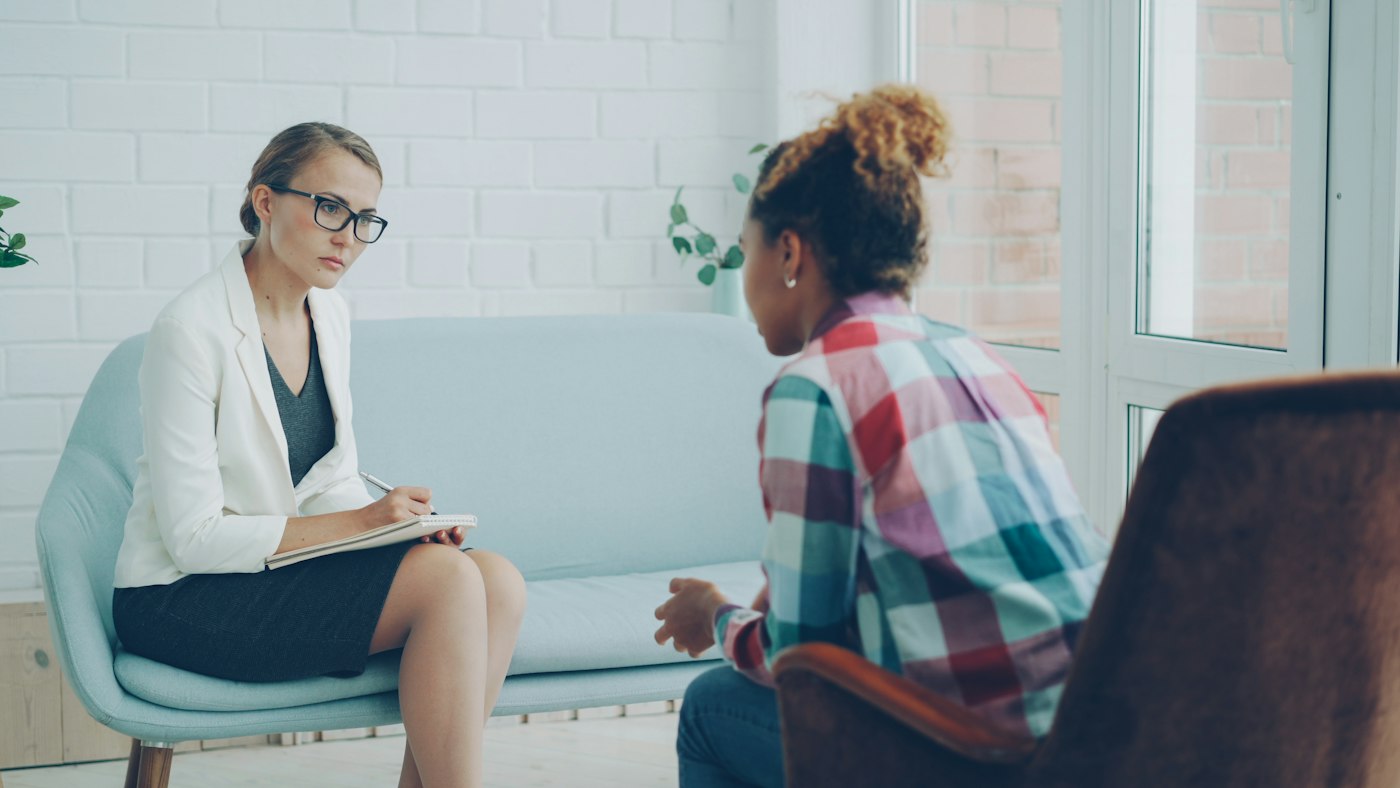 Counsellor listening to a client